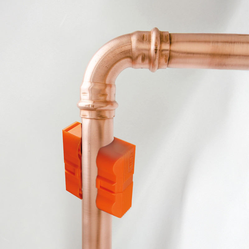 canalisation sur laquelle est fixé un aimant